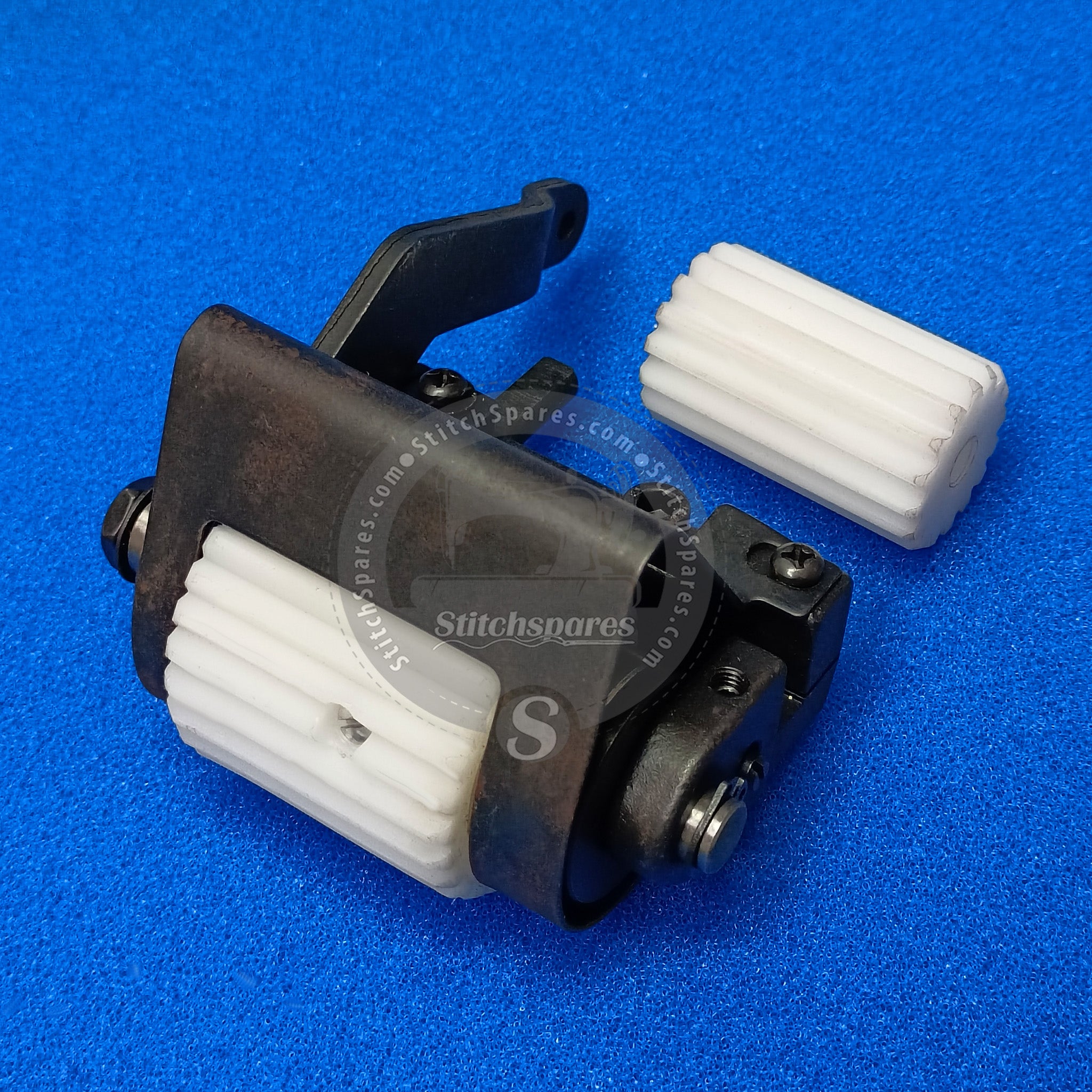 256554-9PY0 Upper Puller Device Asm. PEGASUS W600 Flatlock Machine